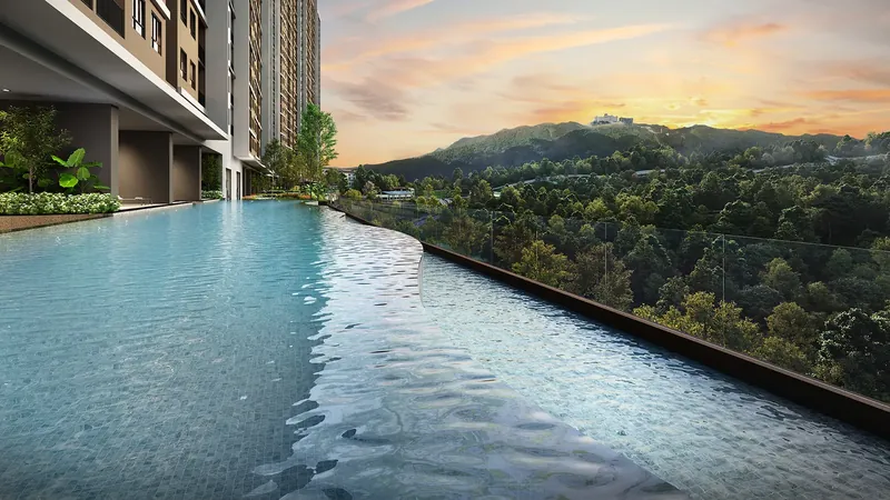 Breeze Hill swimming pool with an infinity edge overlooking the forested hills of Genting Highlands at sunset, artist's impression