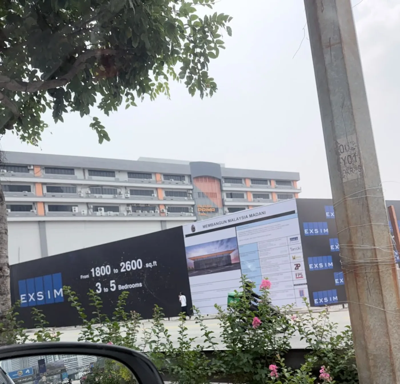 EXSIM site hoarding in Bukit Jalil advertising 1,800 to 2,600 sq ft, 3 to 5 bedrooms, real photo