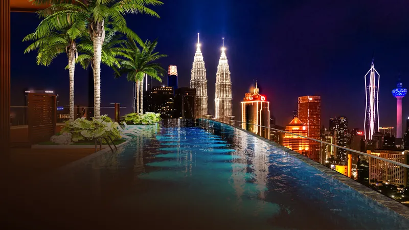 KL360 cliff pool at night, an infinity-edge pool facing the Petronas Twin Towers and the KL skyline, artist's impression