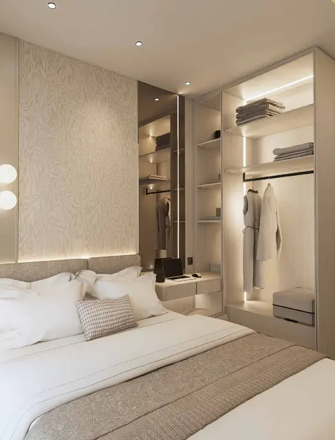 MABA Suitez Type B bedroom with wardrobe and desk in the Ivory Serenity concept by Mana Mana Hospitality, artist's impression