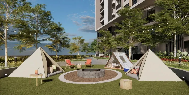 Monterra campsite with a fire pit and tents on the facilities floor, artist's impression
