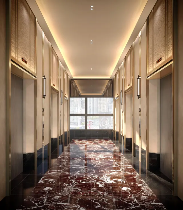 Lift lobby at Phoeniz Suites @ KL City Centre with a marble floor and gold-trimmed lift doors, artist's impression