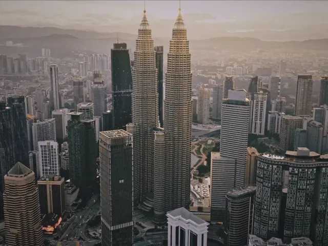 Kuala Lumpur skyline with the Petronas Twin Towers, from the developer's project page for The Ashbourne